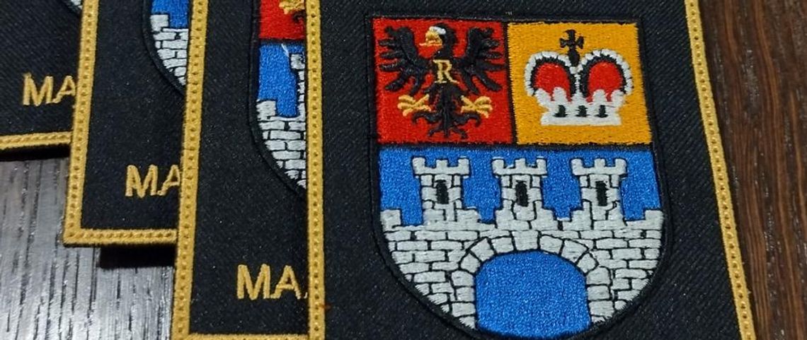 Emblemat z herbem powiatu dla strażaków w Gostyninie
