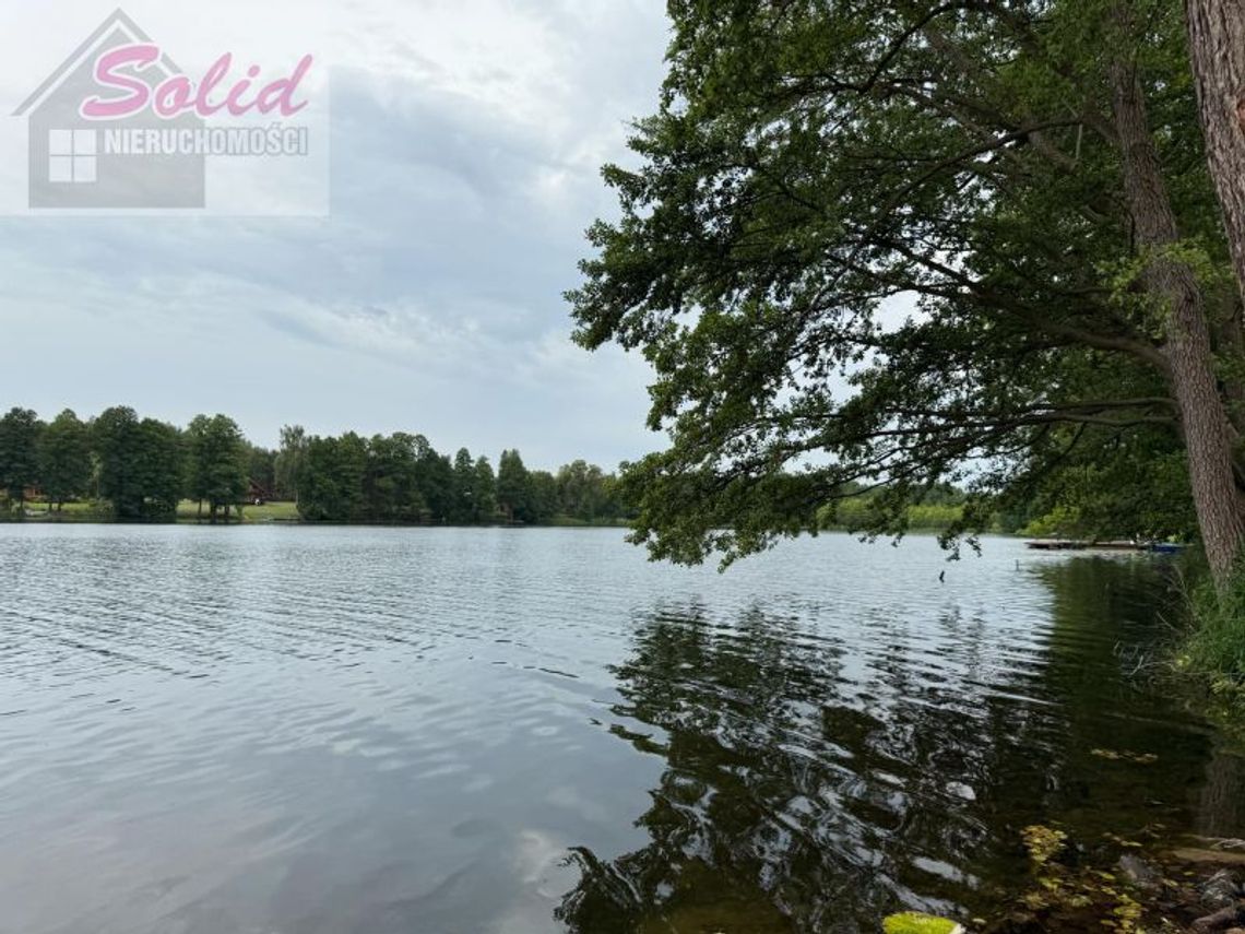 Dzialka z dojściem do jeziora i plażą